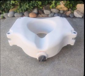 Toilet Riser Locks onto Seat Excellent Condition