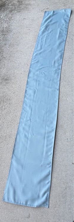 Two sided table runner, light blue on one side brown on the other