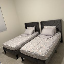 Grey Tuffed Twin Beds x2