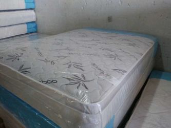 Brand new king pillow top mattress with box spring.