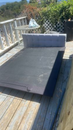 Adjustable electric bed with headboard