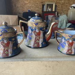 Antique Tea Pots, Saucers And Cups 