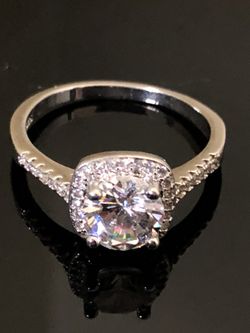 Cubic zirconia ring set in platinum-plated sterling silver