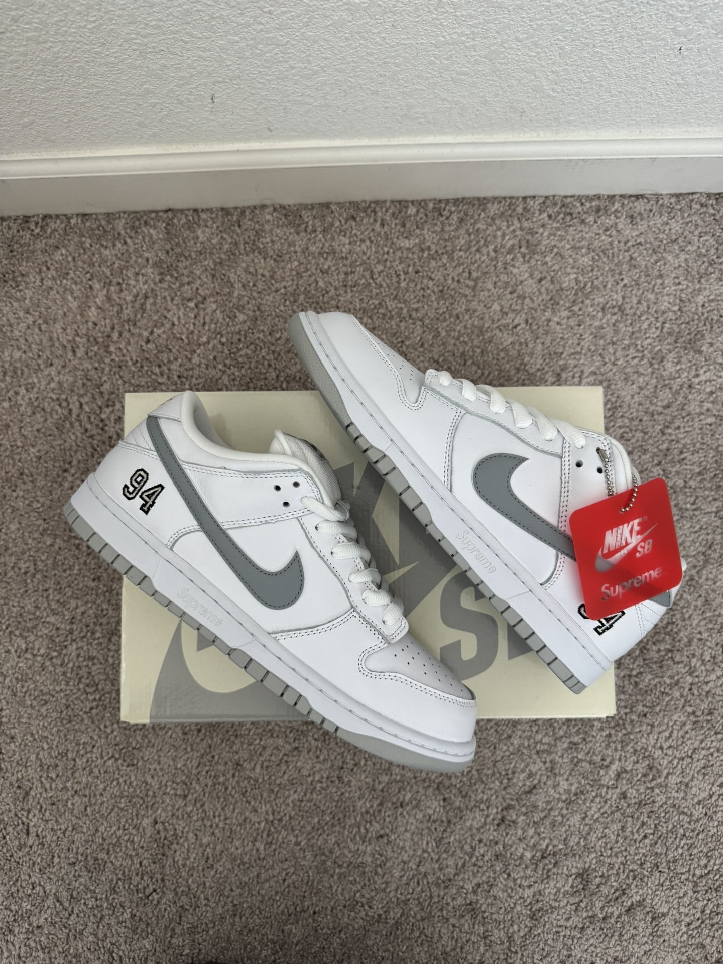 Nike SB Dunk Low x Supreme ‘Metallic White’