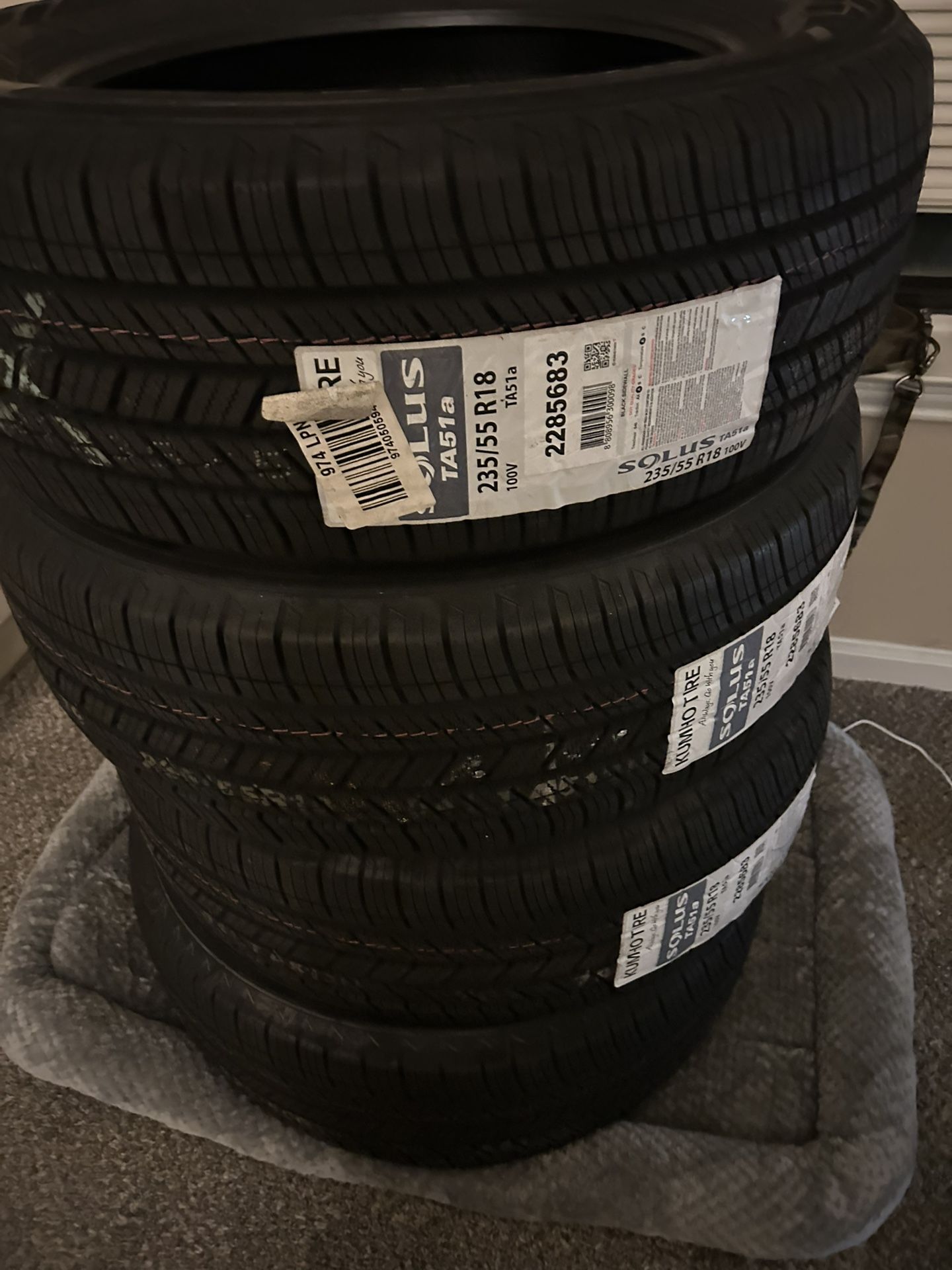 235/55/18