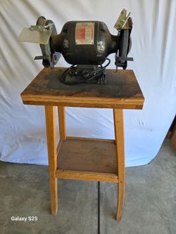 Mounted two wheel grinder