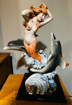 Mermaid and Dolphins Statue