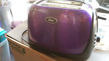  Oster Jelly Bean 2-Slice Toaster, Purple (TSSTTRJBP1