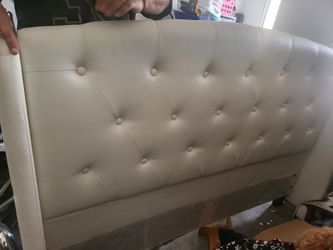 Full size white bed frame.