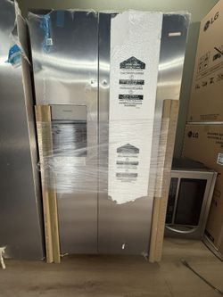 Two door Frigidaire, stainless steel, ice and water refrigerator