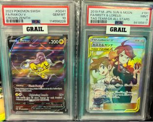 Two pokemon slabs - 1. Raikou V — Crown Zenith GG41 Grading: PSA 10 Gem Mint Year: 2023 English card 2. Misty & Lorelei Tag Team GX — #191 Grading: PS
