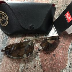 Bolle sun glasses like new with case or Ray Ban . Also Coach Teal Blue Designer .  $50.00 Each