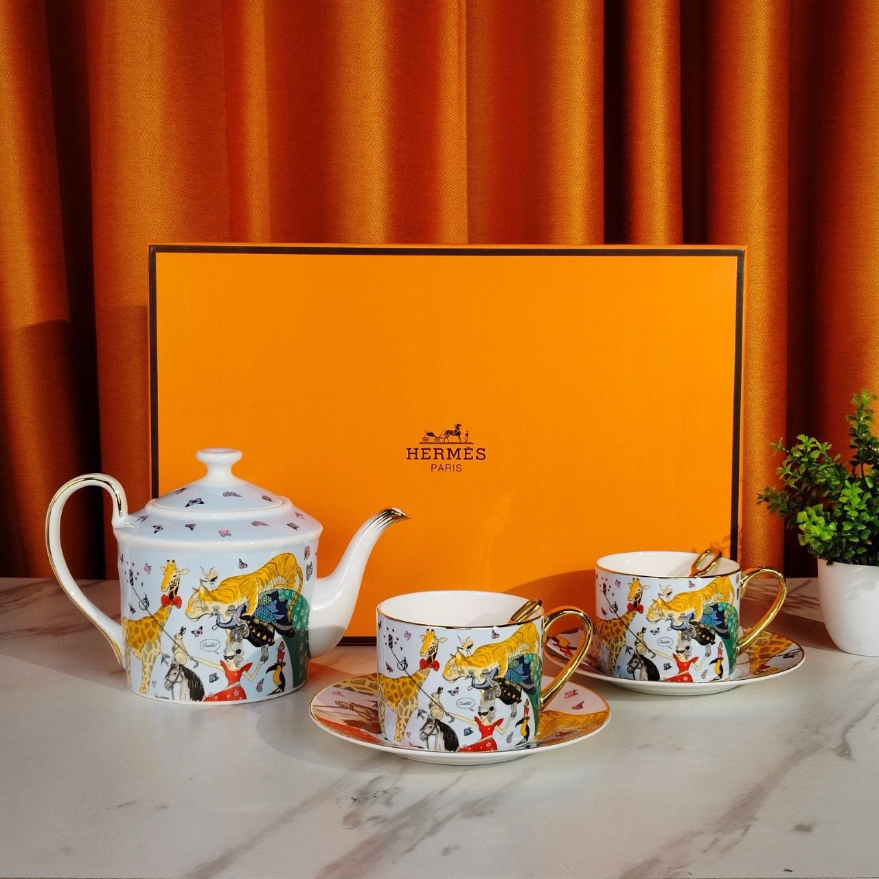 Hermès Paris Porcelain Tea Set with Whimsical Animal Motif – Teapot, Cups & Saucers in Gift Box
