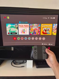 Nintendo Switch with Joy-Con Grip Controller