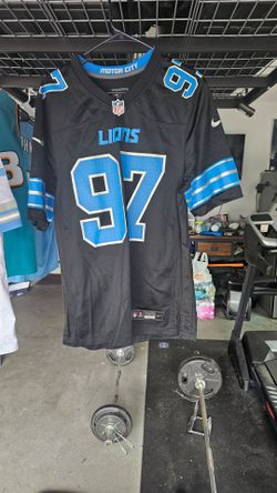 Various football and basketball jerseys