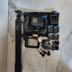 GoPro 10 With Media Mod, Light Mod , 4 Batteries, Selfy Stick,  Bike Mount And Dual Charger