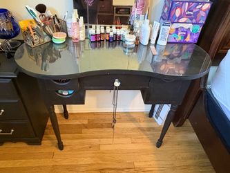 Black vanity with glass top