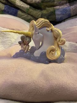 Cute Girl With Unicorn Figure