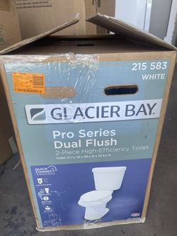 Glacier Bay 12 in. Rough In 2-Piece 1.0 GPF/1.28 GPF Dual Flush Elongated Toilet in White, Seat Included