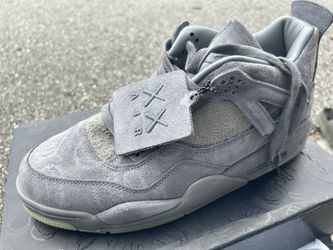 Kaws x Jordan 4’s Cool Greys
