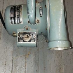 The device shown is a vintage Clements Cadillac Quik-Vac blower and suction cleaner, model F10, manufactured by Ace Sycamore, Inc. Key features includ