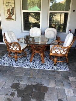 Antique Dining table with 4 rolling chairs USA made
