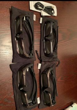 NEW ... SONY 3D Rechargeable Glasses.  Comes with soft glass cases.    Bought for a Bravia TV   I have one of the TDGBR 250s and three of the TDGBR 10