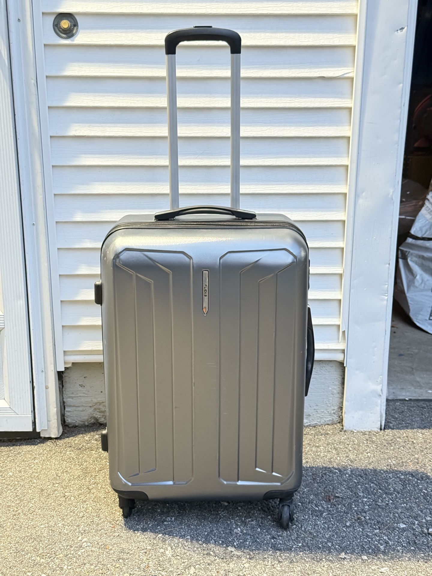 26” Hard-shell suitcase with spinner wheels