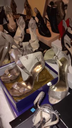 23 PAIRS OF WOMEN’S HIGH HEELS — $375 FOR THE ENTIRE LOT!**