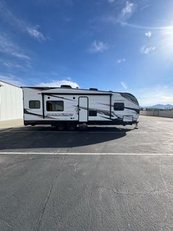 2021 Forest River Shockwave 25RQMX Toy Hauler – Indoor Stored