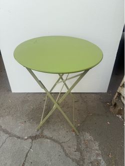 Round folding table with chairs