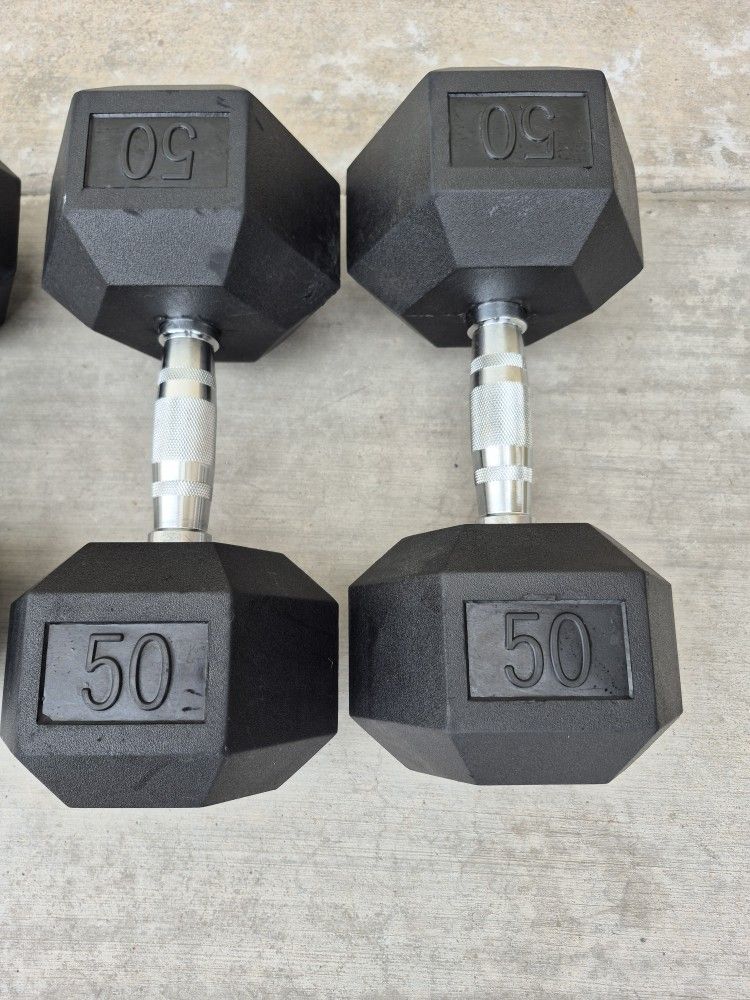 Pair of 50 Lbs. and 35 Lbs. Rubber Dumbbells In Very Good Condition $120 For The Two Pairs