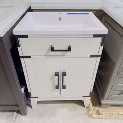 “24” Bathroom Vanity in White Oak with Vanity Top in White  $299 