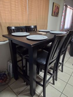 High-top dining set with 4 chairs