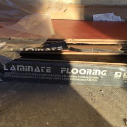 Laminate Flooring  For Free Just Pick Up  One Full Box And 1/2  