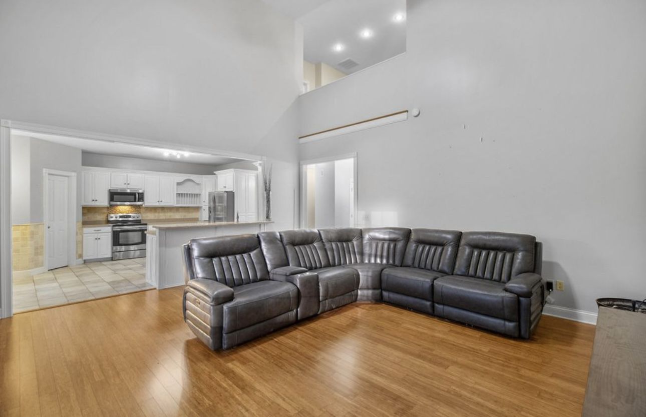 Gray Leather Sectional W/ Power Recliners