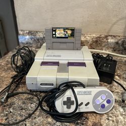 SUPER NINTENDO SYSTEM WITH MARIO GAME INCLUDED IN GRAT CONDITION 