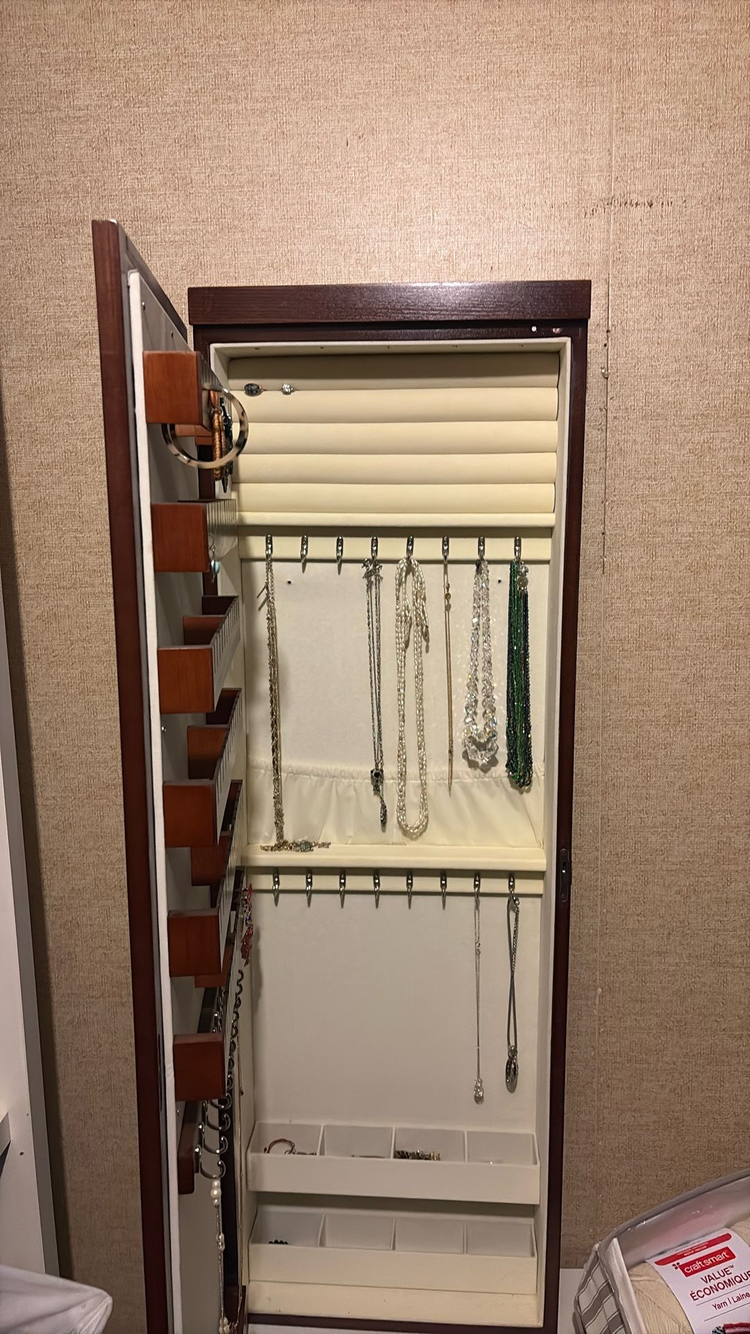 Jewelry cabinet with mirror