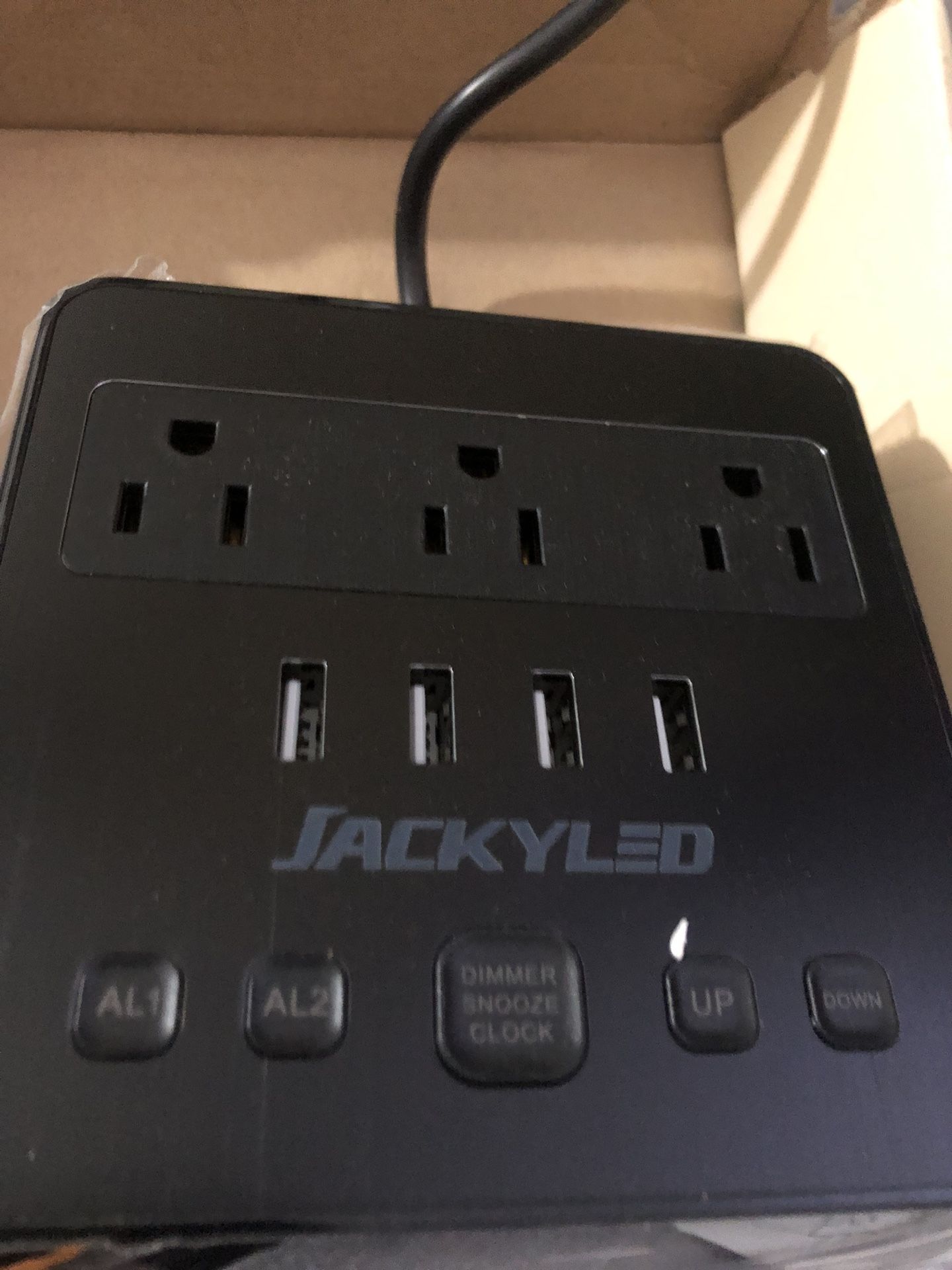 JACKYLED Alarm Clock with 4 USB Chargers Power Strip 3 Outlets 1700J Surge Protector Nightstand Dimmable Digital Clock with Dual Alarm and Snooze Func