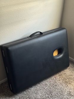 Massage table