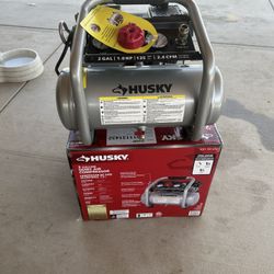 Husky Husky 2 gal. 135 PSI Portable Electric Quiet Air Compressor