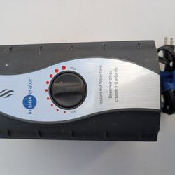 Kitchen InSinkerator Brand Water Heater and dispenser, Garbage Disposer, and faucet