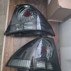 Clear Is300 Taillights With Free Carbon Fiber Covers. 