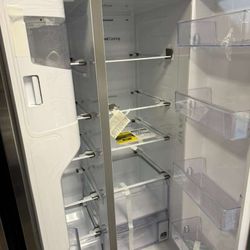 Samsung stainless steel side by side fridge new with warranty