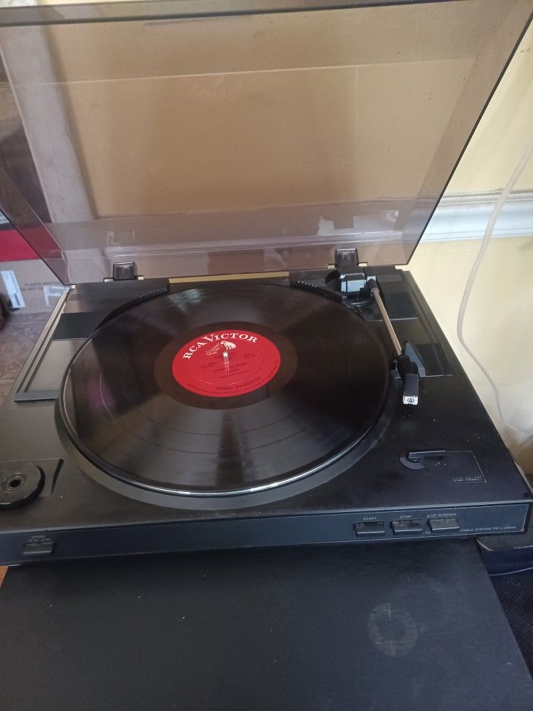 SONY FULLY AUTOMATIC TURNTABLE WITH BUILT-IN PHONO PREAMP AND VINYL ALBUM $160 FINAL PRICE SAME DAY SHIPPING