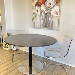 Sleek Round Dining Table With Stainless Steel Base Dining Table, Two Acrylic Chairs