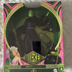 Year 2024 $28.00 Mattel Universal Wicked Deluxe Elphaba Fashion Doll & Accessories, Movie-Inspired Look Braided Hair & Posability