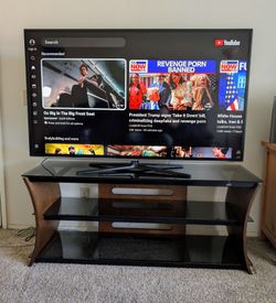 60" Samsung TV And Glass Cabinet