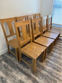8 solid wood chairs