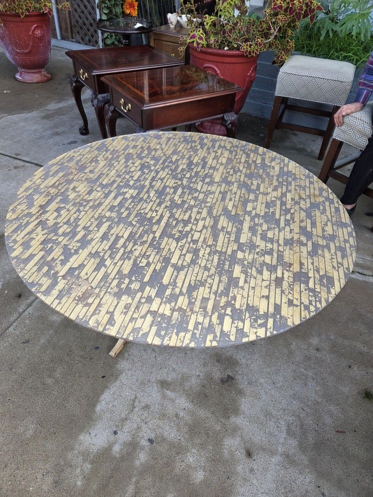 Mid Century Round Table With A Distressed Gold Leaf Finish
